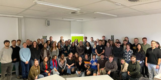 Group photo of the first PCS cohort and faculty members