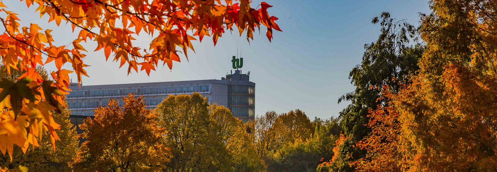 The Math tower with TU logo in fall.